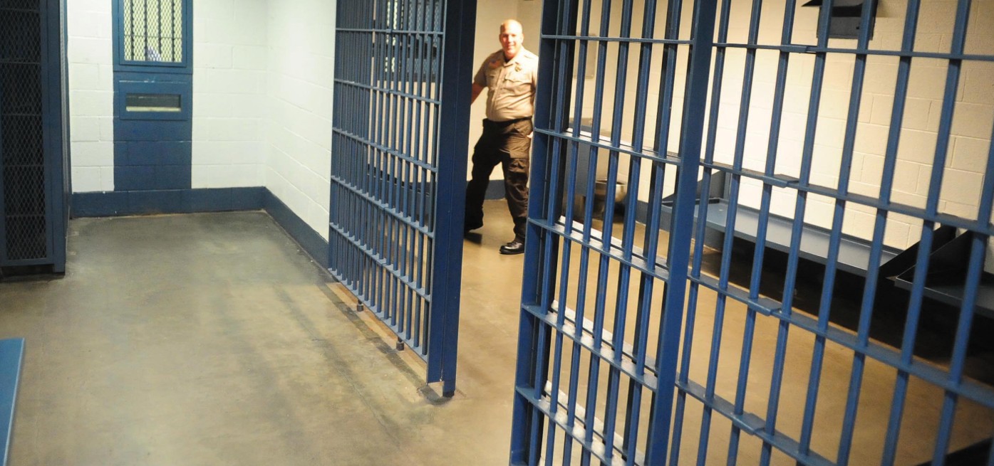 Ensuring Confidentiality and Order: Placement of Cell Phone Jammers in Conference Rooms